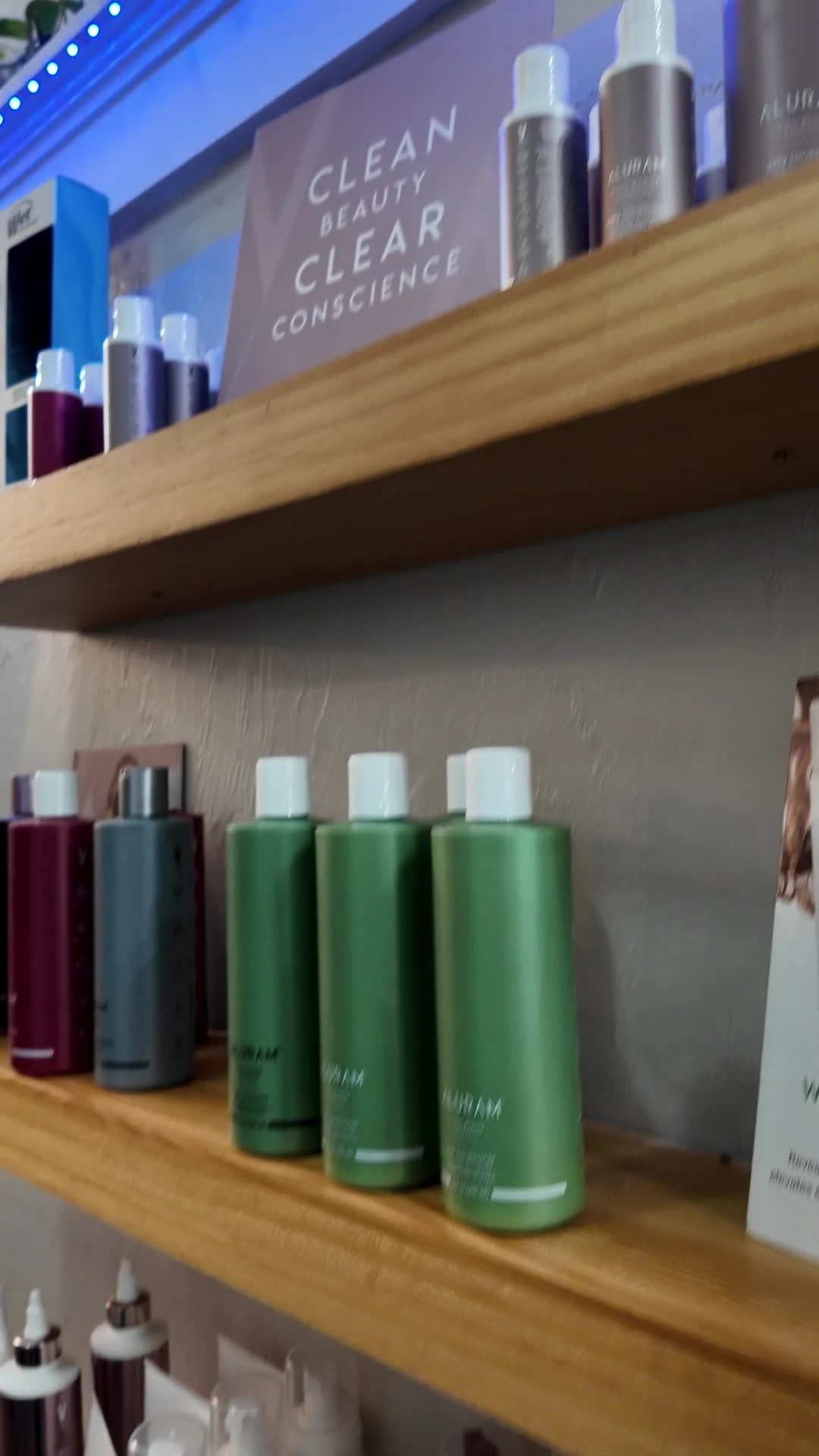 Haircare products on Kelley’s actual salon shelves